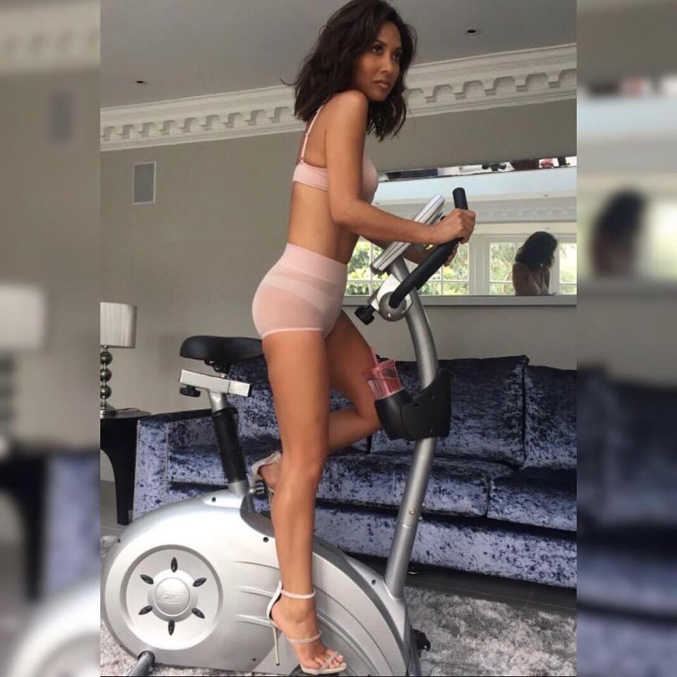  The former singer posed in her undies and a pair of heels on an exercise bike