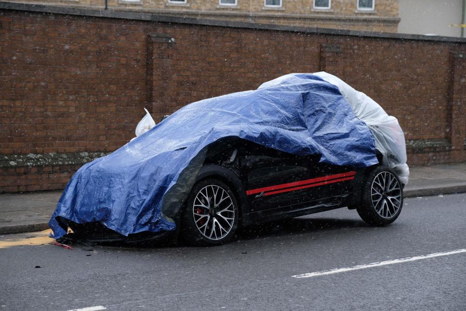  Ant's mini - which he was driving in alongside his mum - was covered in tarpaulin following the accident