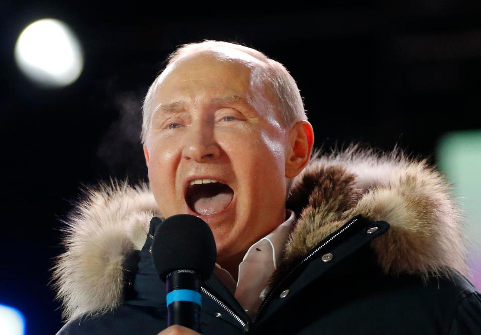  Putin delivers a speech following his victory in the election