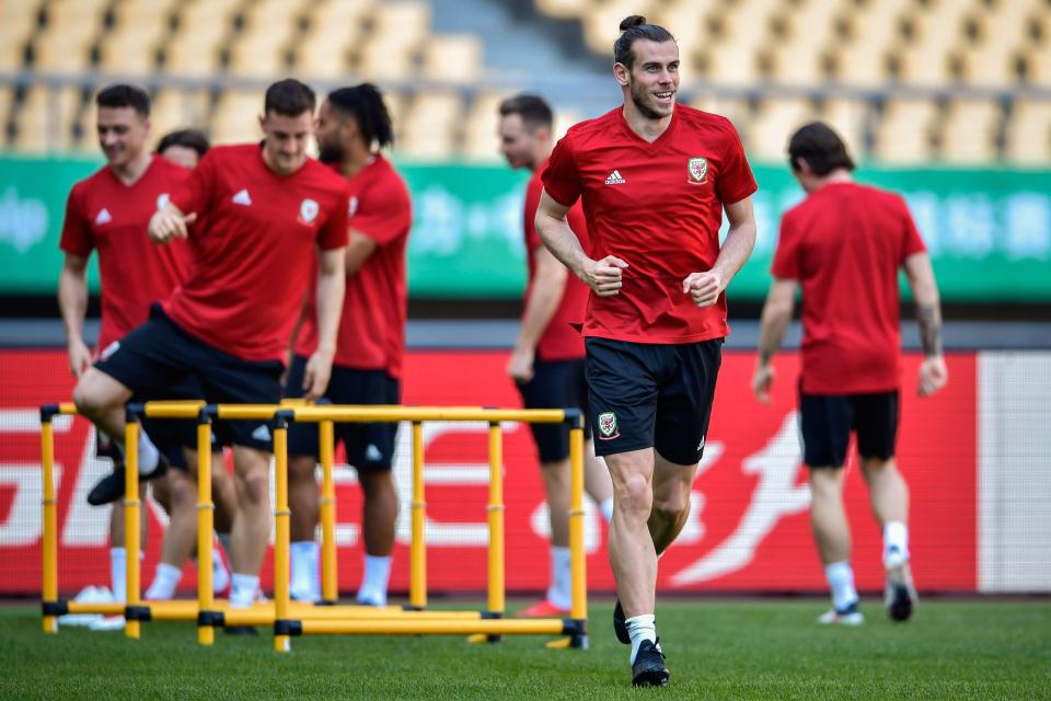  Bale training with his team-mates ahead of the China Cup final