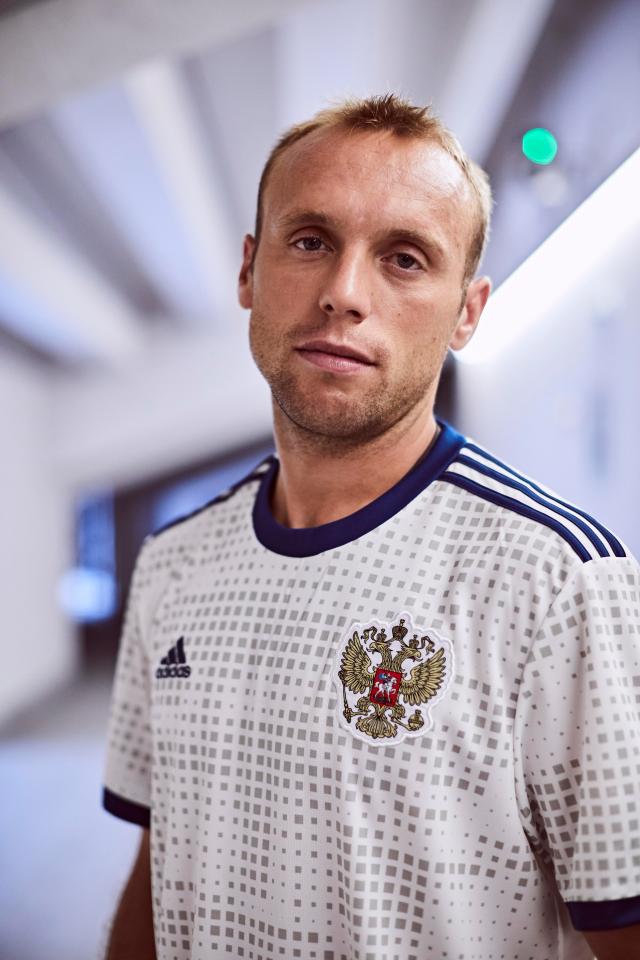  Hosts Russia have a rather bland looking grey top