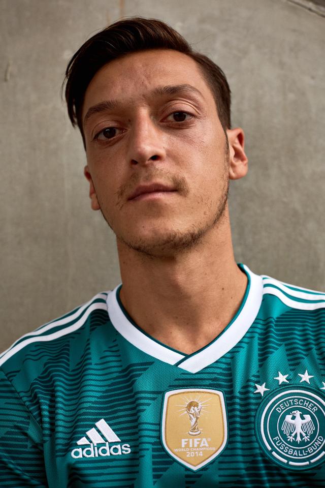  Mesut Ozil and Germany will go green for their title defence