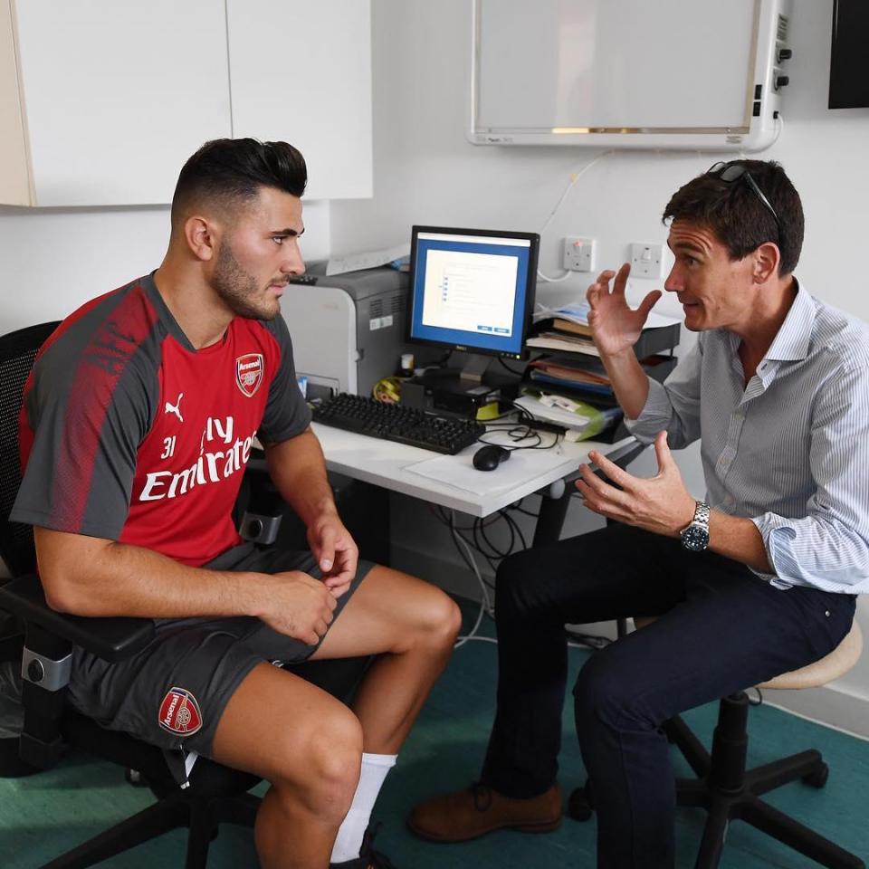  Sead Kolasinic appeared to be in consultation with one of Arsenal's backroom staff