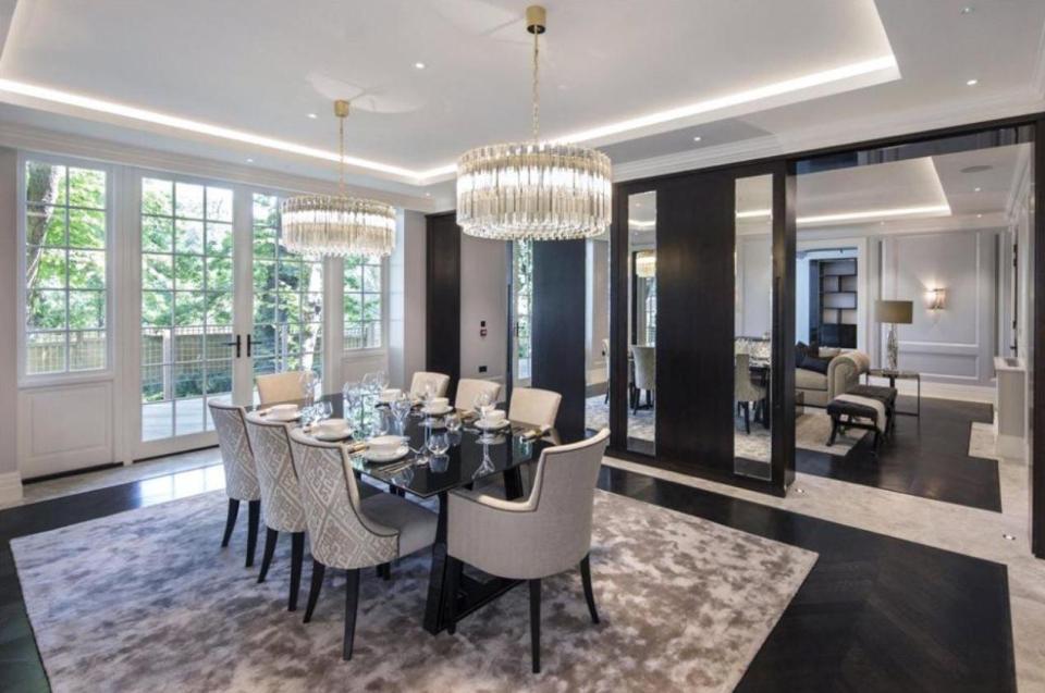  Pierre-Emerick Aubameyang's plush dining room is right next door to the living room and well-lit with light from outside