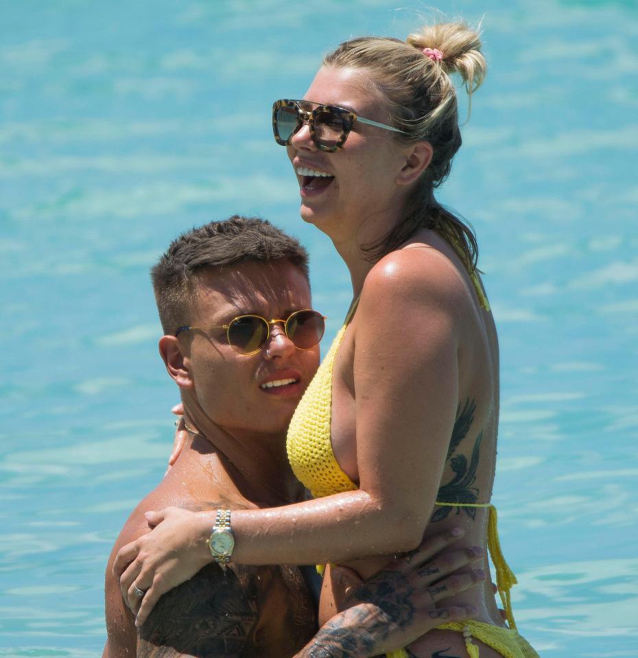  Olivia Buckland looked as though she was having the time of her life as she straddled fiancé Alex Bowen in Barbados