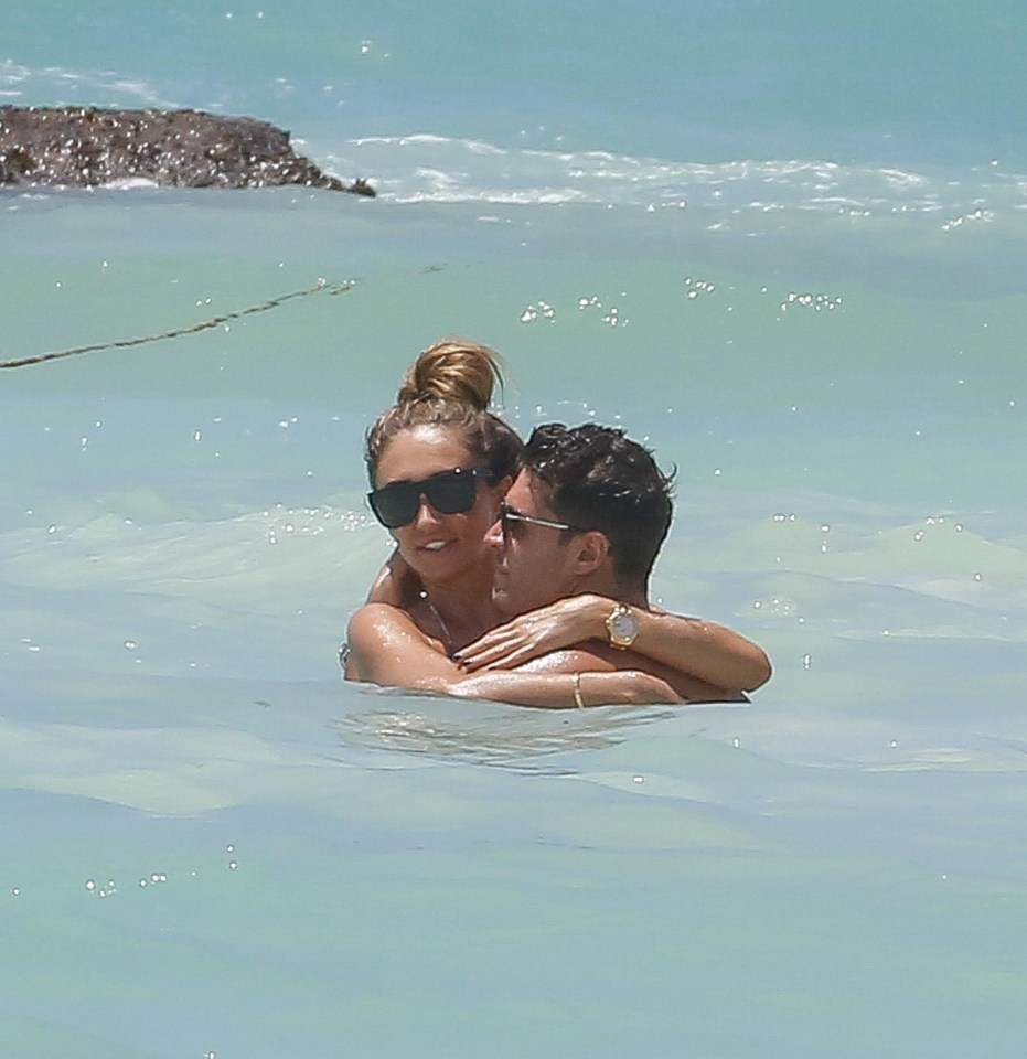 Megan McKenna and Mike Thalassitis couldn’t keep their hands off each other as they went for a dip in the Caribbean sea