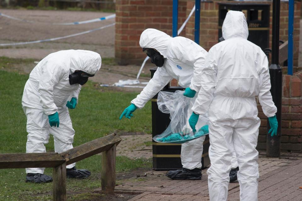  Police in protective gear investigate the nerve agent attack