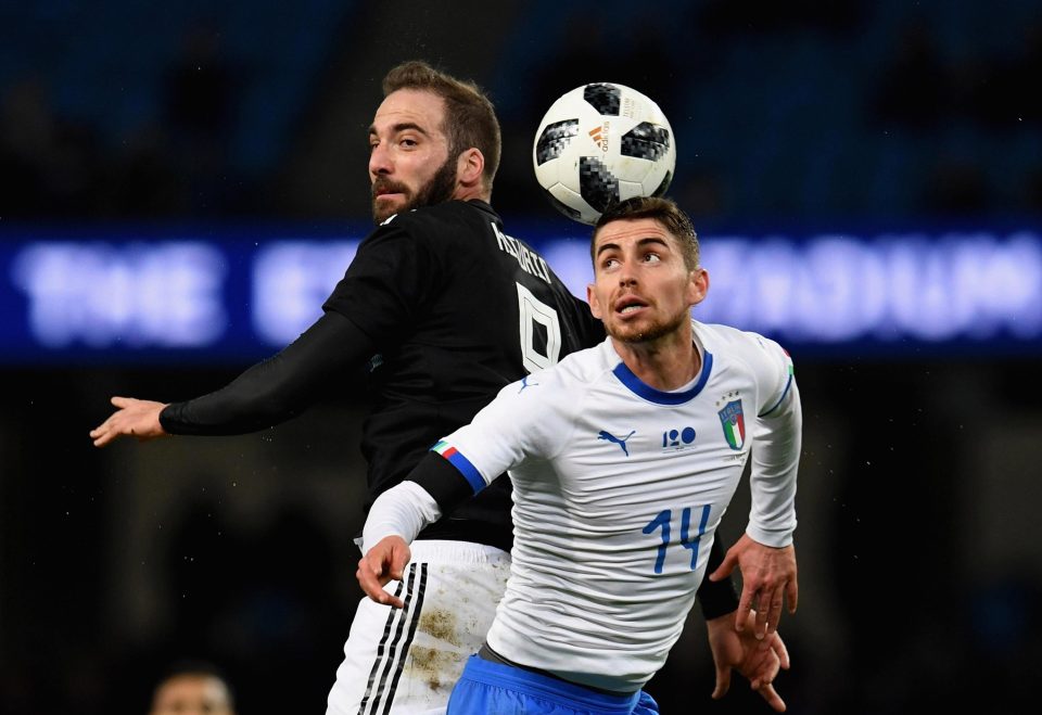  Jorginho, right, goes up for a header against Gonzalo Higuain during Italy's 2-0 loss to Argentina in Manchester