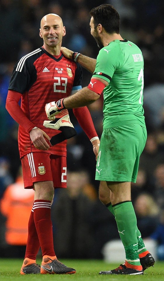 Gianluigi Buffon and fellow veteran Willy Caballero relax after Argentina beat Italy 2-0