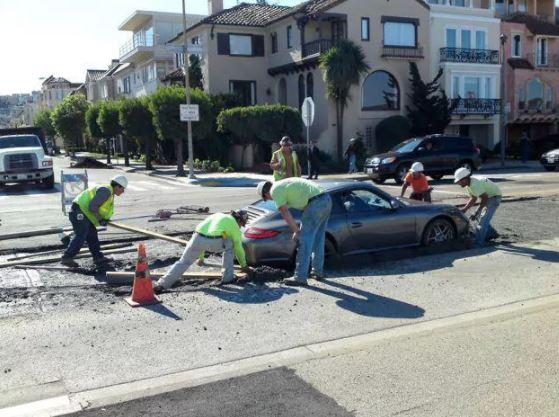 This car owner discovered the true meaning of regret when they drove their expensive car into newly-laid concrete