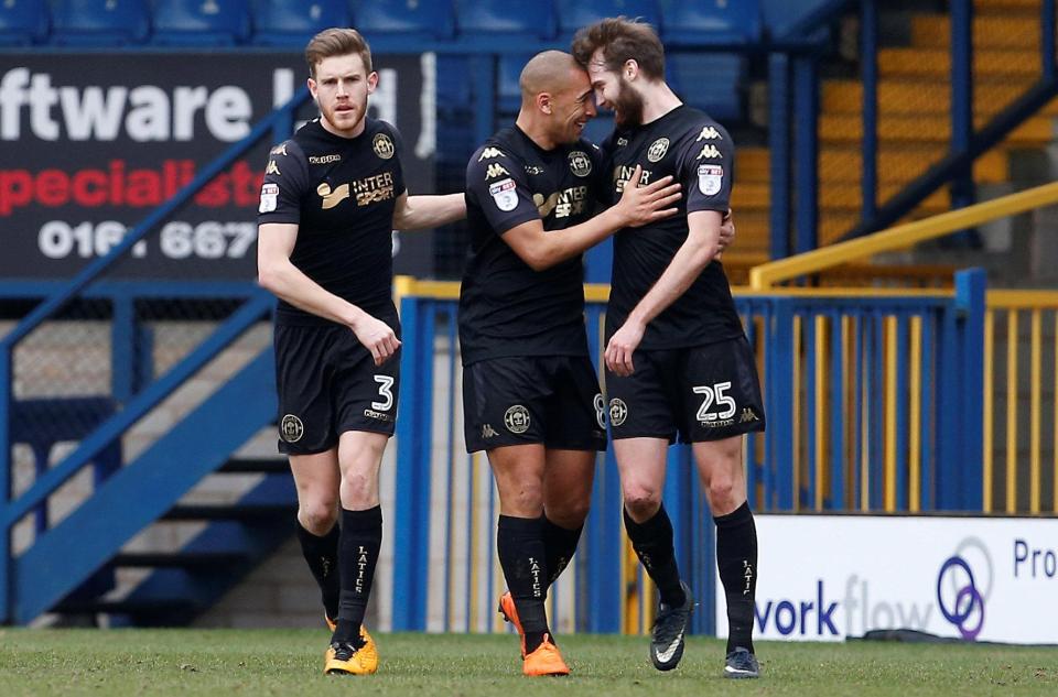 Nick Powell's 13th goal of the season helped Wigan to victory at Bury