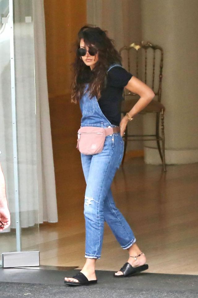  The 30-year-old actress kept it casual in dungarees which she teamed with a black top and black sliders