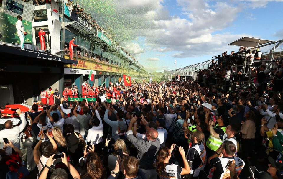  Fans watch in Melbourne as Sebastian Vettel celebrates winning season opener