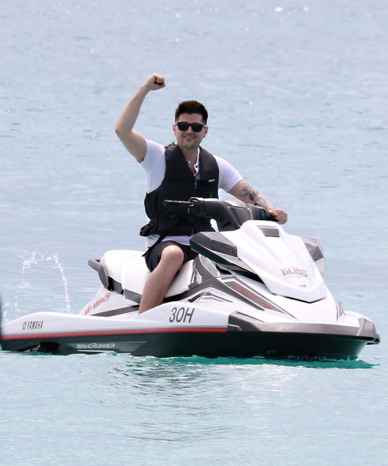 Danny enjoys his time away on a jet ski