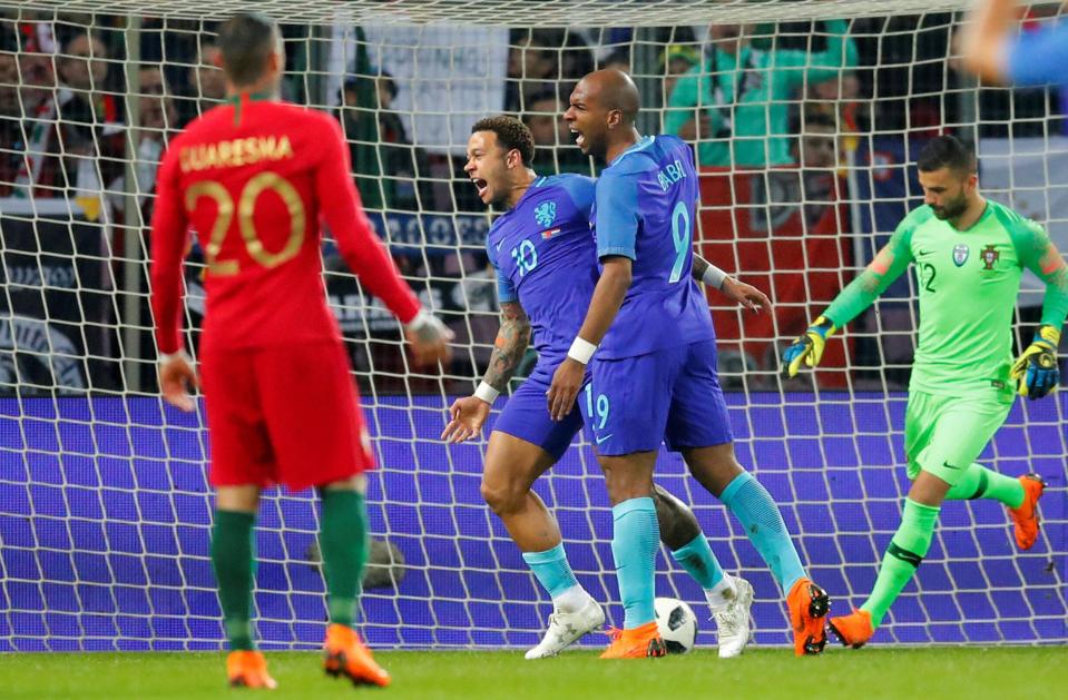  Memphis Depay scores as Portugal beat Holland in Geneva