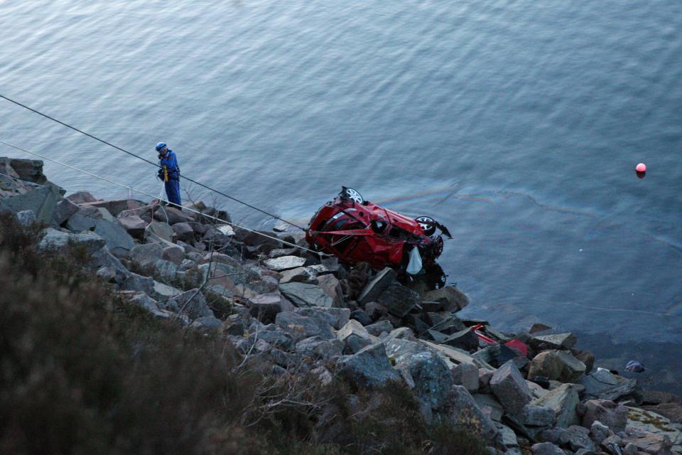  The car is pulled back up the bank