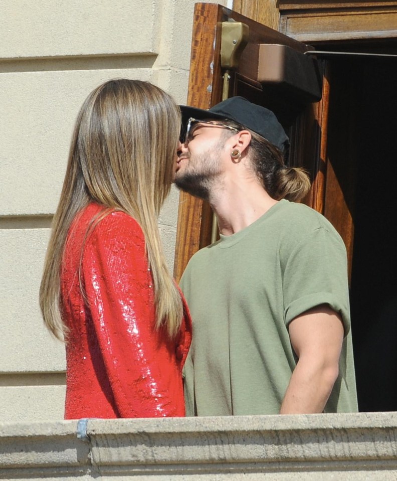 Heidi Klum and her German guitarist lover, Tom Kaulitz, 28, couldn’t keep their hands off each other during a break from filming