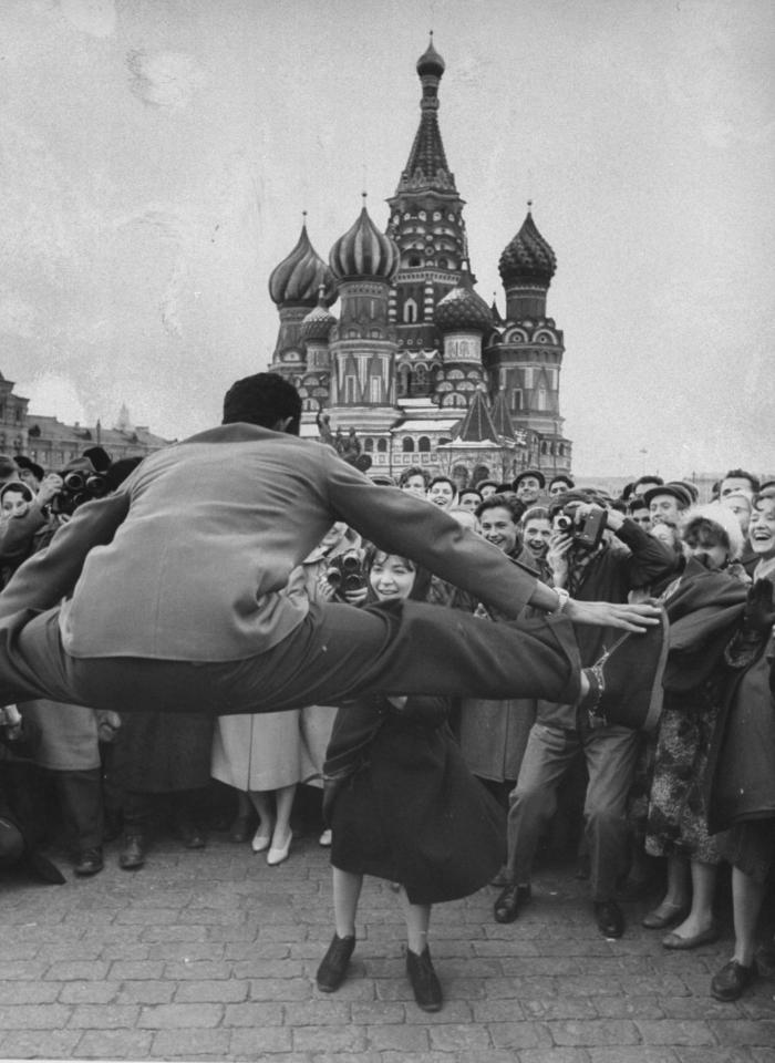  Crowds celebrating earth orbiting space flight of cosmonaut Yuri Gagarin in Moscow