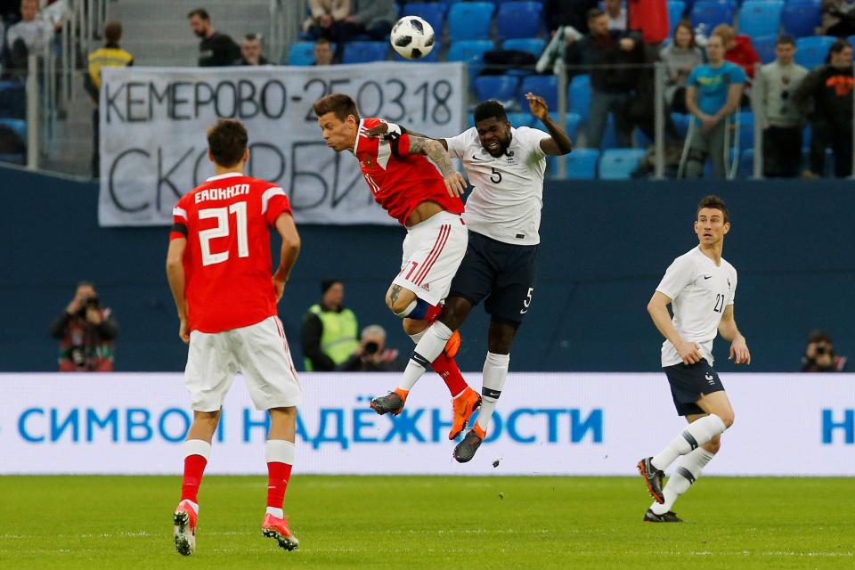  Samuel Umtiti helped France beat Russia 3-1 as potential team-mate Paul Pogba returned with bang