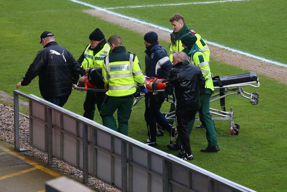  Luke Berry was eventually taken off on a stretcher after a nine-minute delay