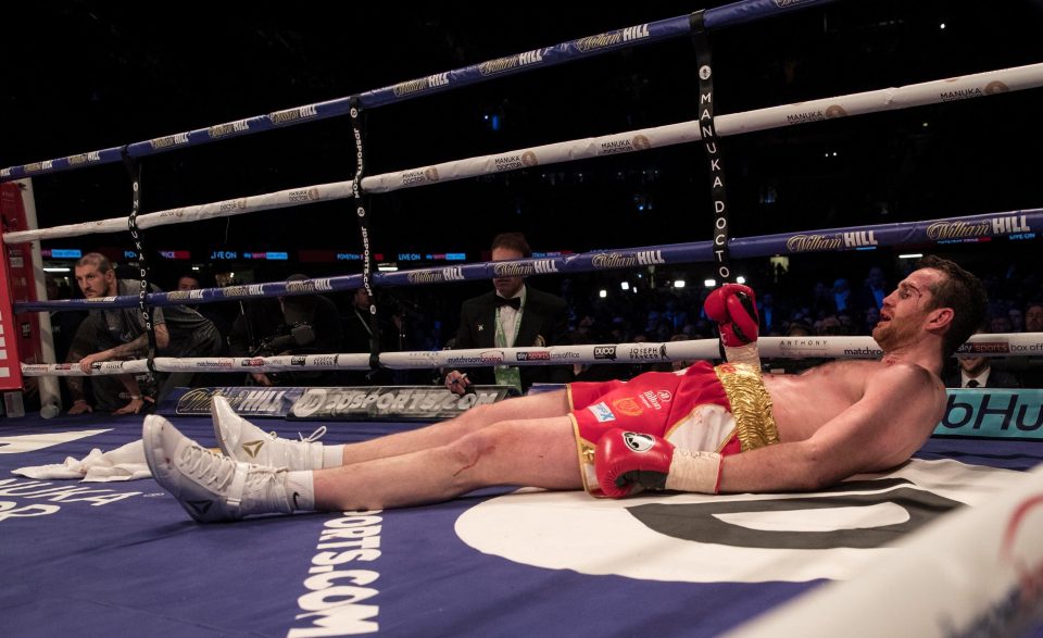  The Liverpool fan was left sprawled across the canvas as referee Howard Foster waved away the contest