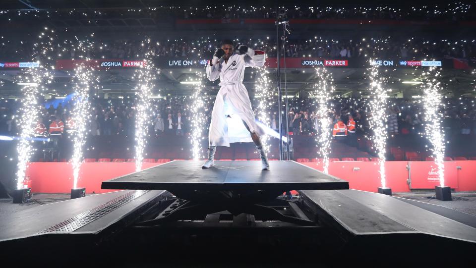  Anthony Joshua is cheered on by thousands at the Principality Stadium as he walks out