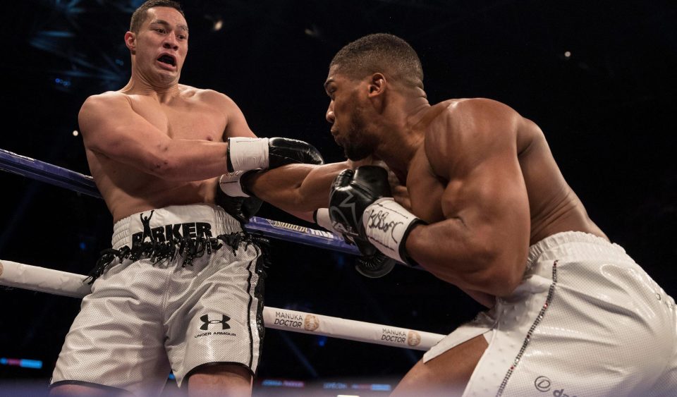  Joseph Parker is caught by a powerful Anthony Joshua body shot