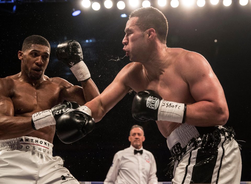  Joseph Parker tries to gain the upper hand by attacking Anthony Joshua