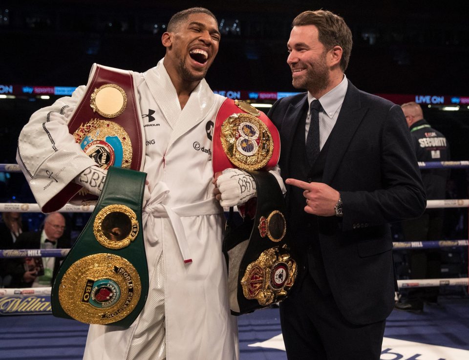  Anthony Joshua celebrates with promoter Eddie Hearn after beating Joseph Parker