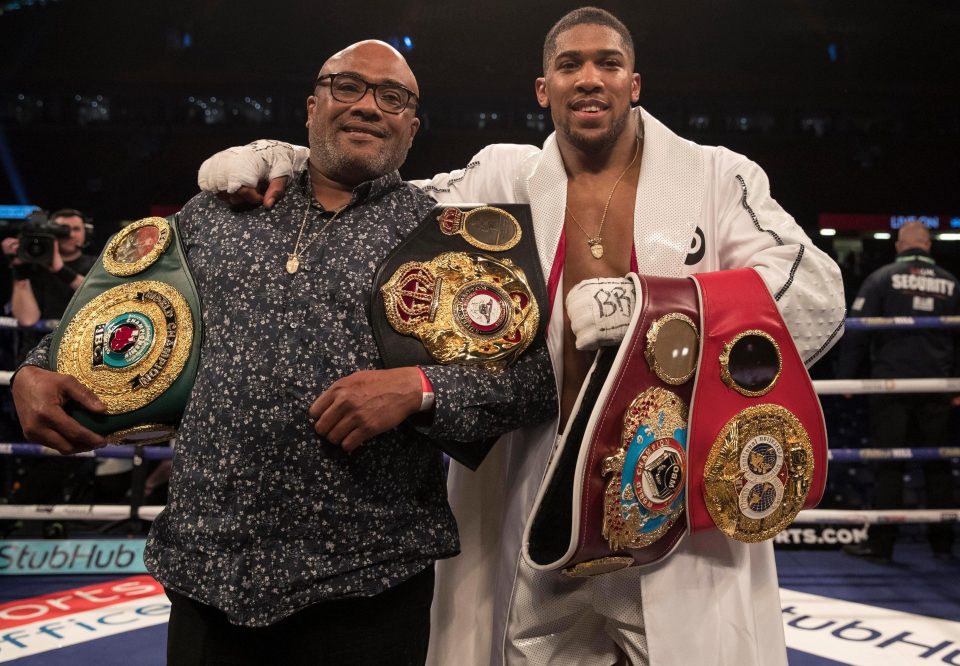  Anthony Joshua celebrates his world title win with dad Robert