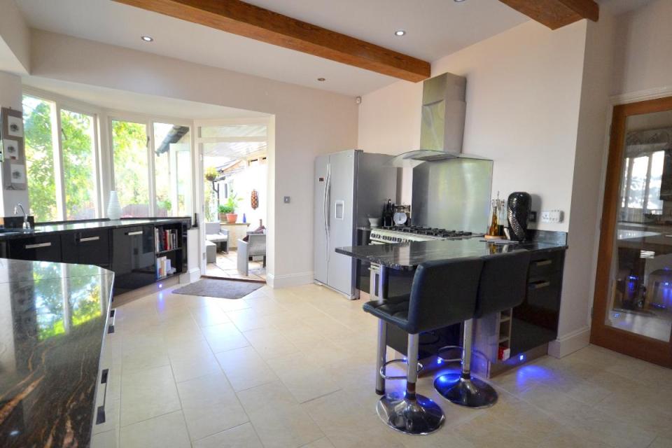  There are also snazzy blue LED lights lining the cupboards along the floor