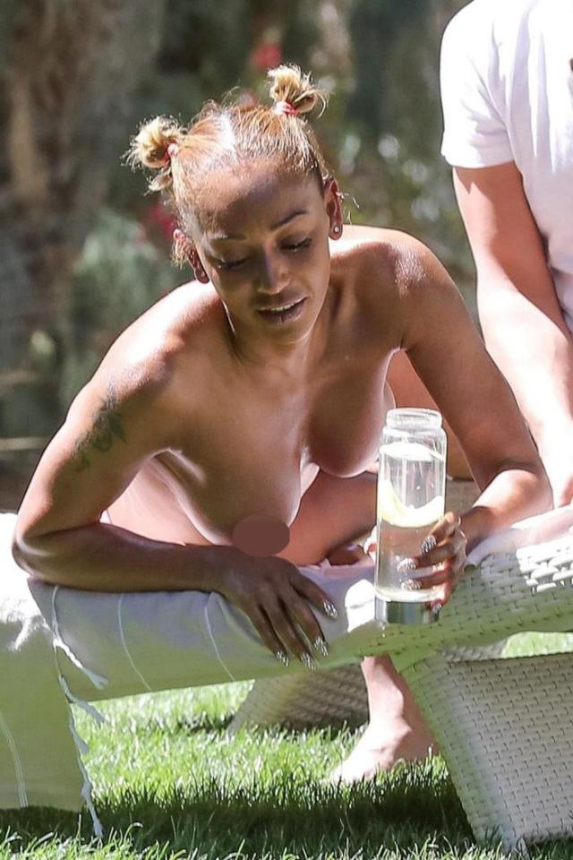  Mel B sunbathed topless on the last day of her holidays