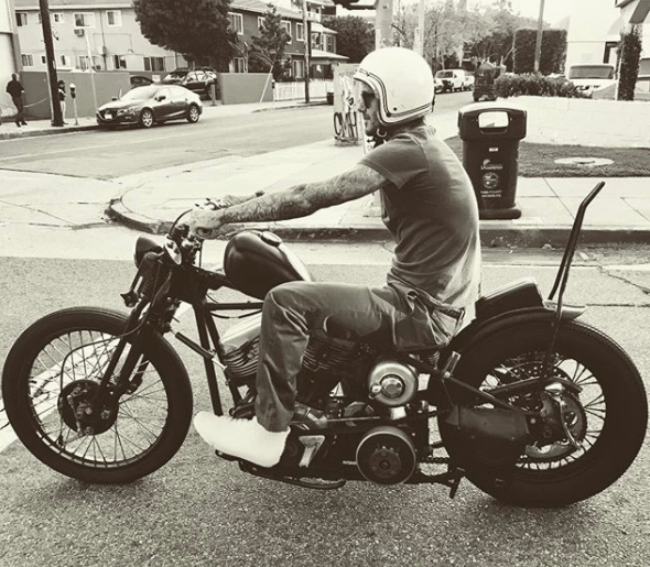  David Beckham absolutely loves riding round on his motorbike