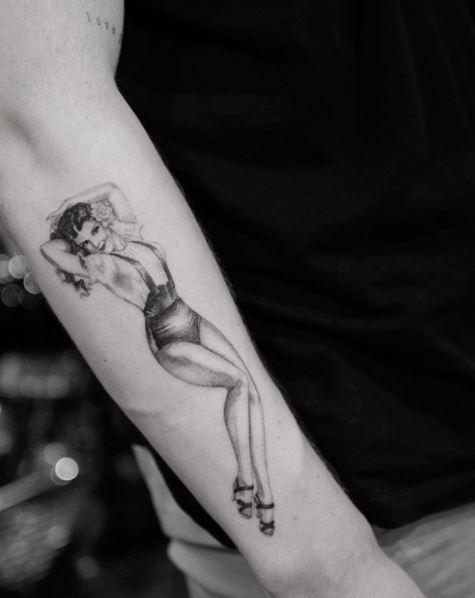  Brooklyn's tattoo artist, Doctor Woo, posted a picture of the photographer's latest inking