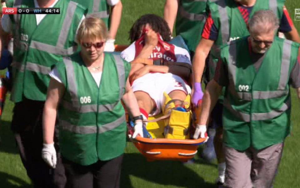 Mohamad Elneny was taken off on a stretcher with his leg in a protective brace during Arsenal's Premier League clash with West Ham