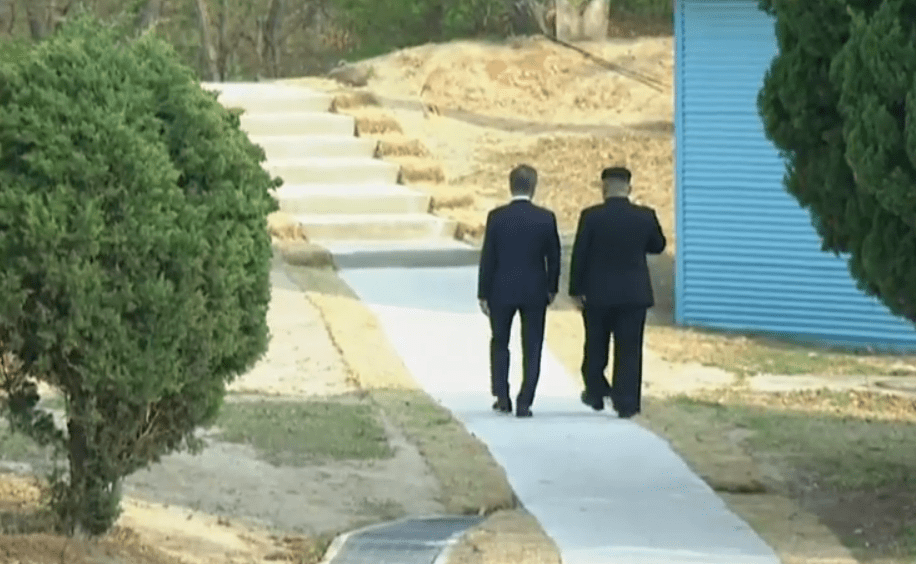  After the tree planting ceremony Kim and Moon wandered off on their own for a private chat