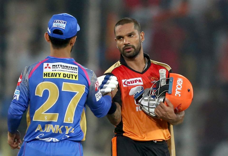  Shikhar Dhawan shakes hands with Ajinkya Rahane after Hyderabad beat Rajasthan on Monday