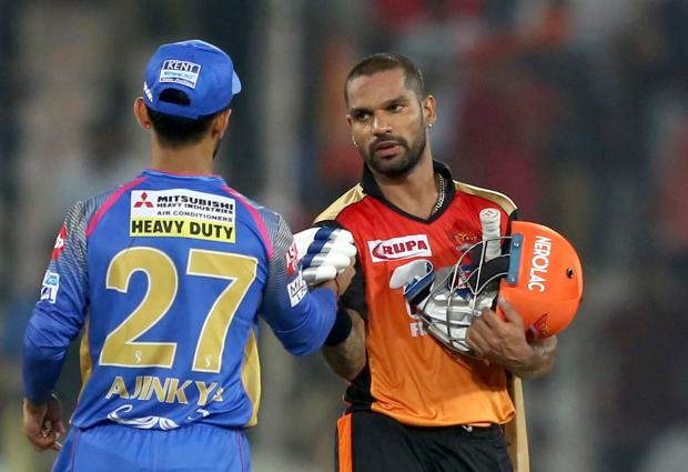 Shikhar Dhawan shakes hands with Ajinkya Rahane after Hyderabad beat Rajasthan on Monday