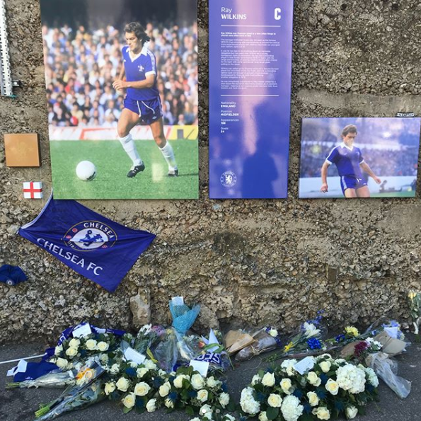  Terry posted a picture of the flowers placed under a photo of Wilkins at Chelsea's home stadium