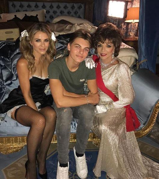  Liz on the set of Royals next to son Damian and co-star Joan Collins