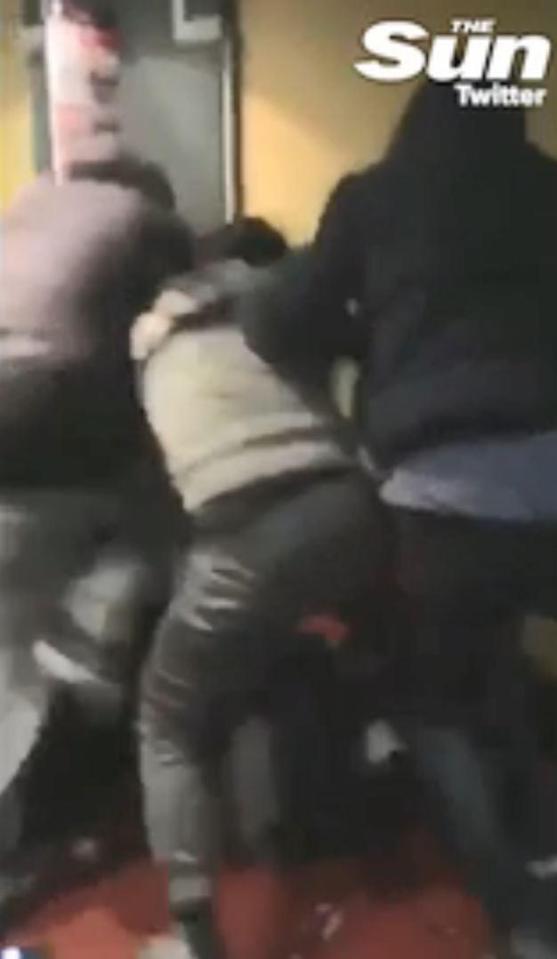  The brutal video shows a gang beating up a young black man on the stairwell of Tinseltown diner