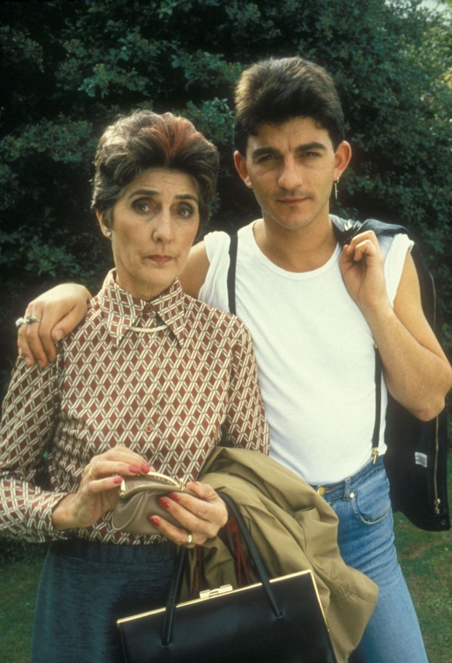 June Brown, pictured with John Altman as Nick Cotton, made her debut in 1985