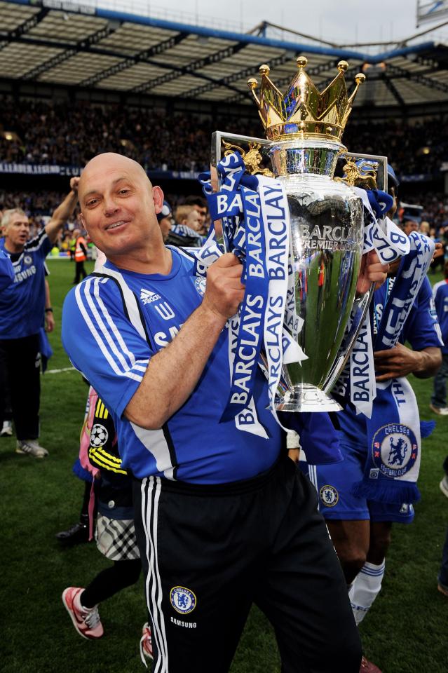  Ray Wilkins lifts the Premier League trophy while assistant coach with the Blues in the 2009/10 season