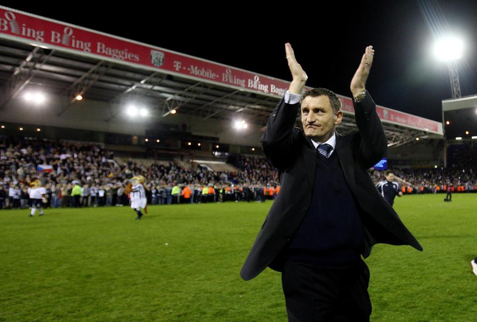  Tony Mowbray celebrates after winning promotion to the Premier League