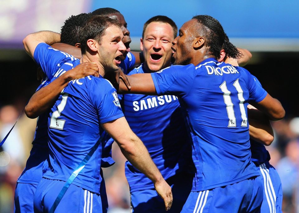  Ivanovic, Drogba and Terry celebrating after winning the Premier League in 2003