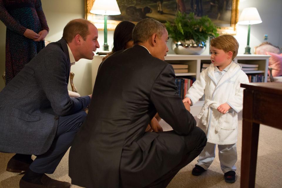  Prince George steals the show in a dressing gown meeting the then-US President at home