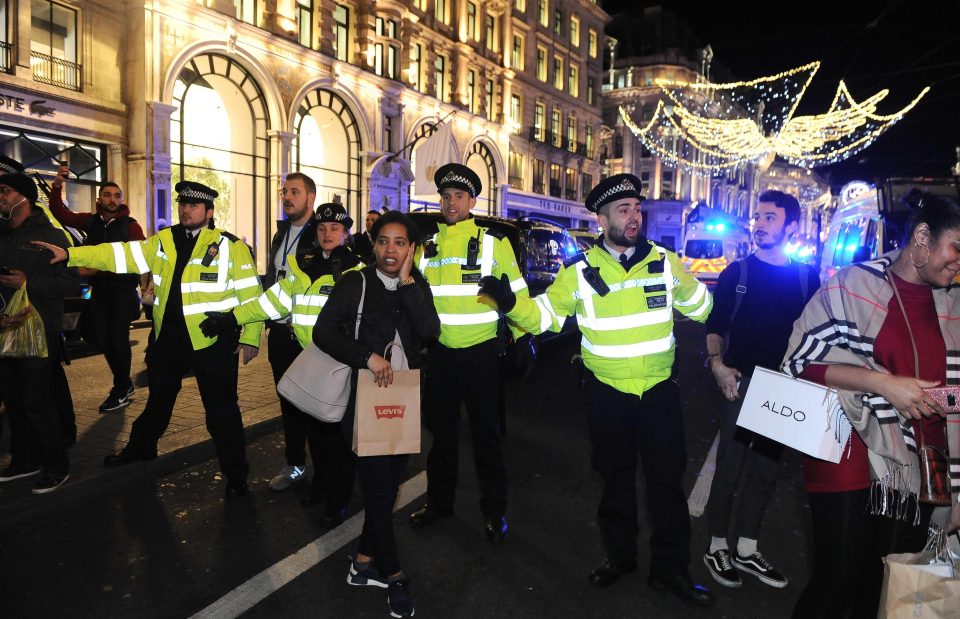  Police evacuating shoppers on Oxford Street during the incident last November