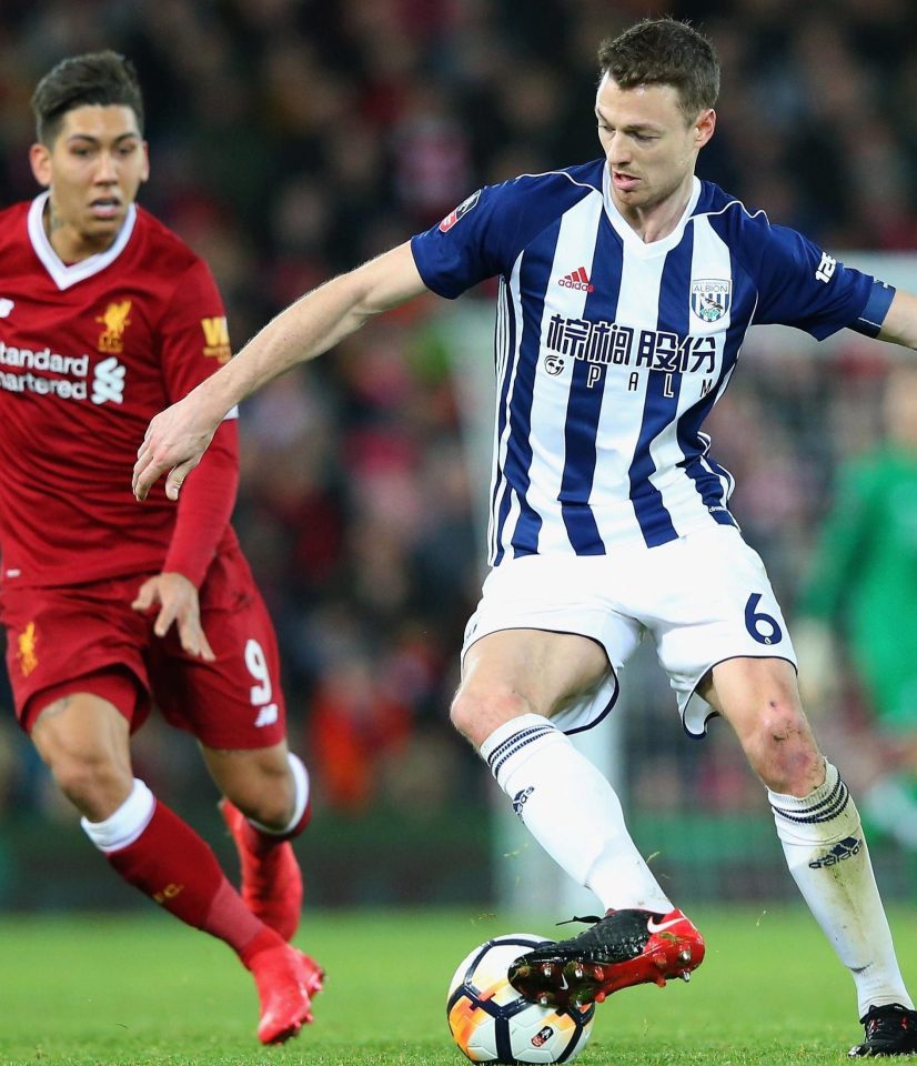  Jonny Evans fends off Roberto Firmino during January's FA Cup tie with Liverpool