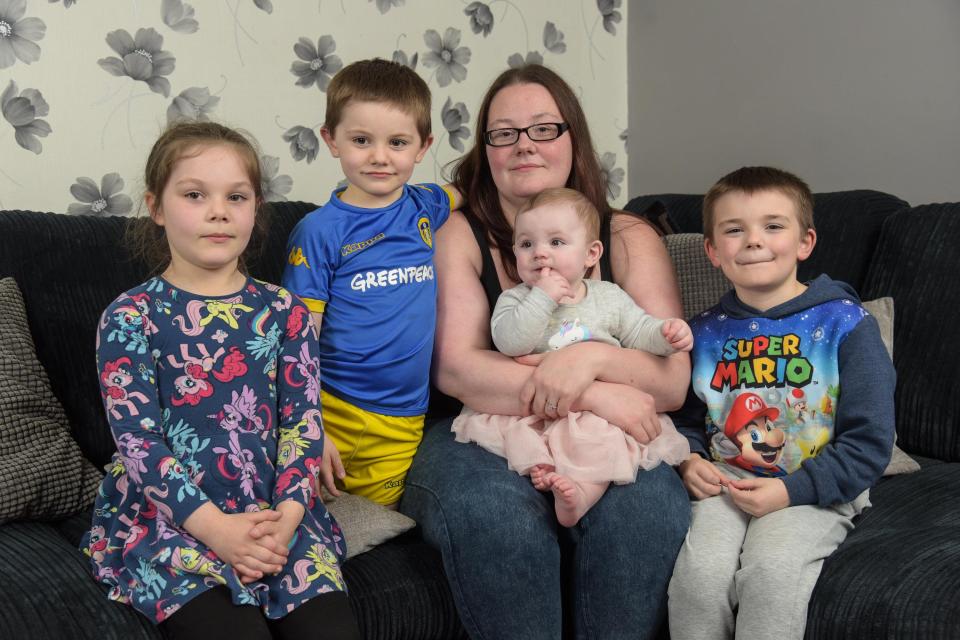  Sarah felt she had to choose between putting the heating on or paying back her loans. From left to right: Amy 7, Harry 5, Sophie 8 months, James 8