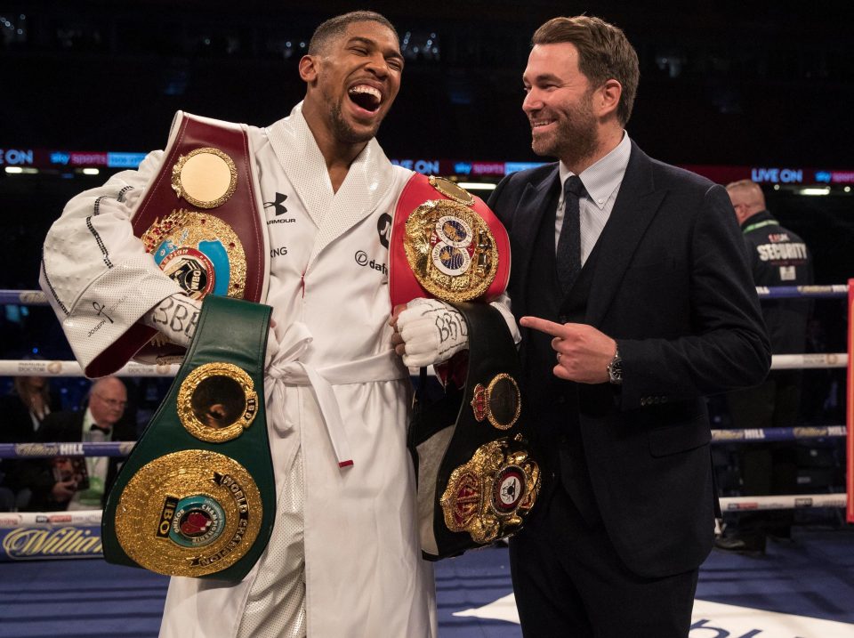  Matchroom promoter Eddie Hearn celebrates with Anthony Joshua after his win against Joseph Parker